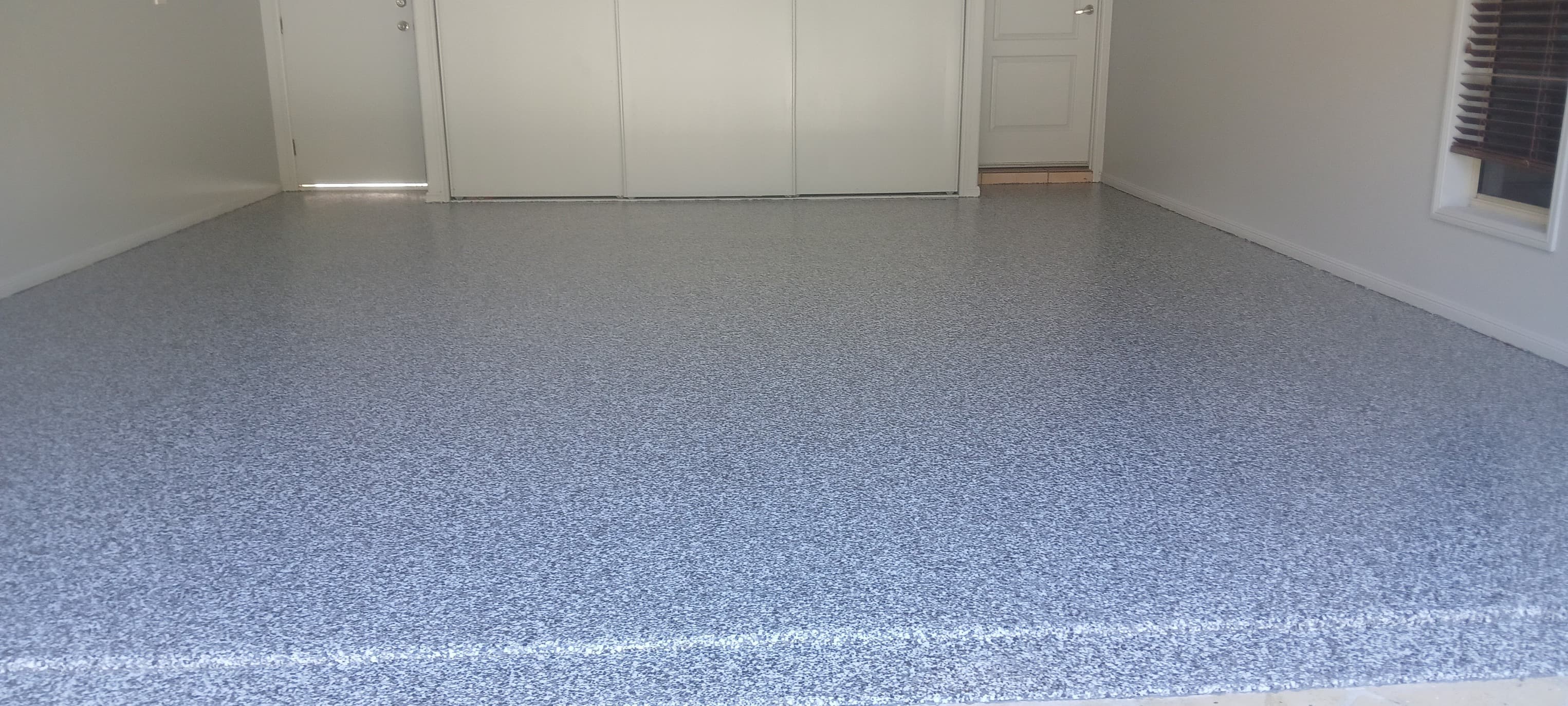 Finished epoxy garage floor after PSR Coatings installation